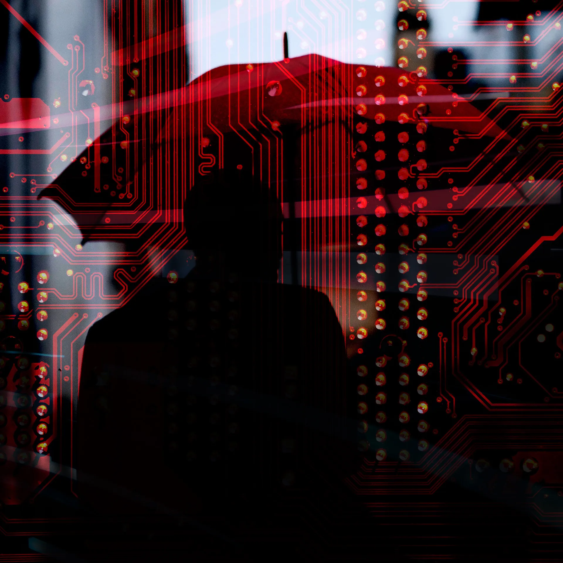 Silhouetted person with umbrella on red and black circuit board